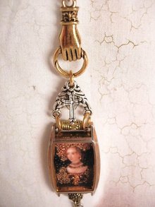 Jeweled Miniature portrait renaissance queen encased in glass Reliquary Shrine necklace with religious medals assemblage