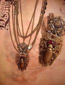 Bizarre Egyptian Scarab jeweled swag necklace dripping in chains