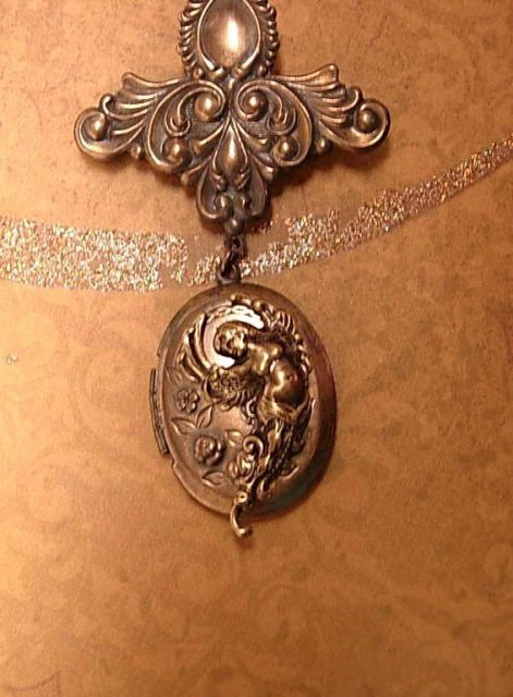 Vintage Art Nouveau winged Nude Cherub Locket brooch with old photo