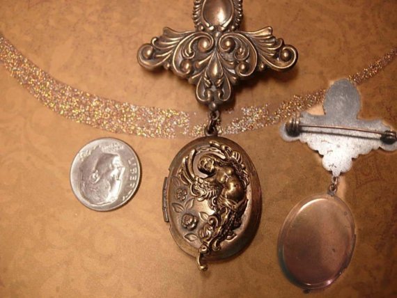 Vintage Art Nouveau winged Nude Cherub Locket brooch with old photo
