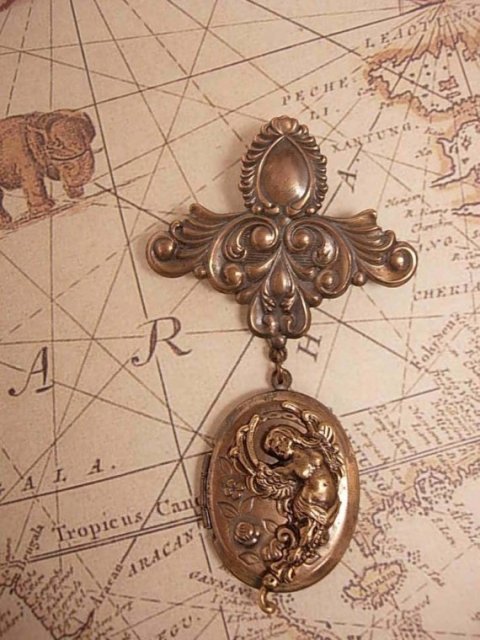 Vintage Art Nouveau winged Nude Cherub Locket brooch with old photo