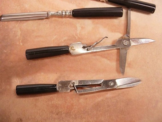 Miniature Bakelite purse Manicure set with Unusual carved design