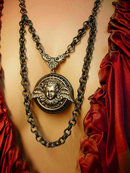 Gothic Winged Cherub locket necklace dripping in gunmetal chain