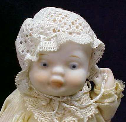 Miniature Bisque Baby Doll + Cradle