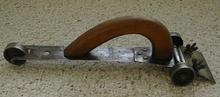 Antique Hand Scraper on Cast Iron Wheels Rare!