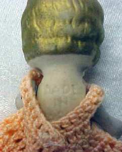 All Bisque Miniature Doll Peach Dress