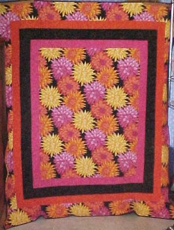Throw Twin Quilt Dahlias 67 x 80 oranges pinks yellows blacks