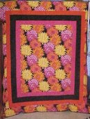 Throw Twin Quilt Dahlias 67 x 80 oranges pinks yellows blacks