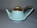 Modern China Co. Sebring, Ohio 22 KT. gold trimmed blue teapot
