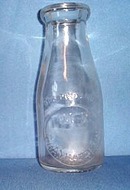 W. R. Chamberlain embossed pint milk bottle