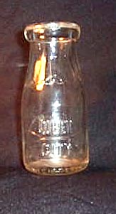 Queen City embossed half-pint milk bottle