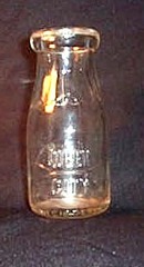 Queen City embossed half-pint milk bottle