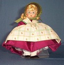 Madame Alexander's Denmark Doll with striped apron