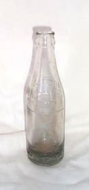 Whistle Bottling Company embossed soda pop bottle