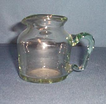 Ernest Glass blown glass pitcher