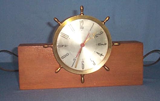 O. B. McClintock Company brass ship's wheel clock