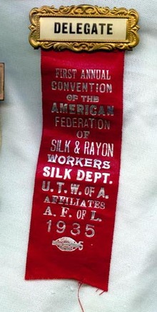 1935 First Annual Convention of the American Federation of Silk & Rayon Workers Silk Dept. U.T.W. of A., Affiliates A..F. of L. delegate's badge