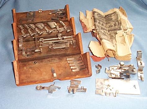 Singer finger-jointed oak box with sewing machine attachments