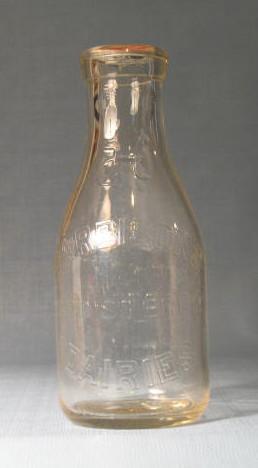 Harbisons Registered Dairies Philadelphia PA embossed quart milk bottle