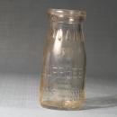 Supplee Wills-Jones embossed half-pint milk bottle
