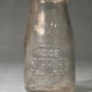 Supplee 1442 N. 11th St. Philadelphia PA embossed half-pint milk bottle