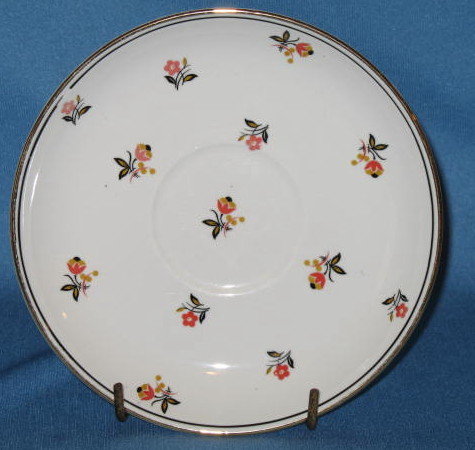 Homer Laughlin Nautilus Cardinal saucer