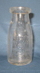 Tilton's City Dairy, Asbury Park NJ embossed half pint milk bottle