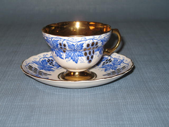 Rosina gold grape clusters with blue leaves cup and saucer