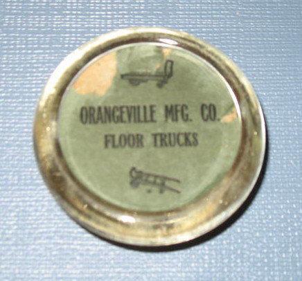 Orangeville Mfg. Co. Floor Trucks glass paperweight