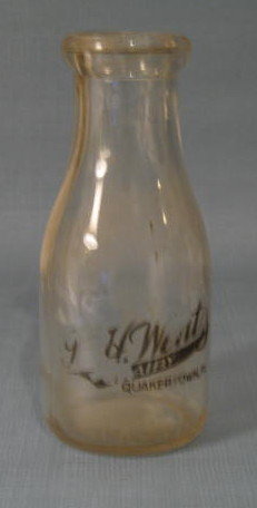 J. H. Wentz, Quakertown PA black pyro pint milk bottle