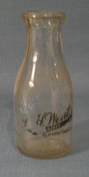 J. H. Wentz, Quakertown PA black pyro pint milk bottle