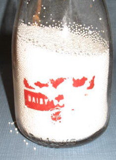 Supplee Sealtest Dairy quart milk bottle with red pyro
