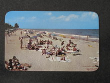 Sun and surf attracts many to the Florida beaches postcard