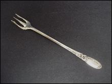 Antique Condiment Fork White Orchid by Community