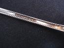Antique Condiment Fork White Orchid by Community