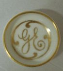 TINY LIMOGES OPEN SALT DISH MONOGRAM GE