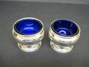 PAIR OF STERLING SILVER SALT & PEPPER CELLARS
