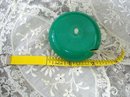 VINTAGE CELLULOID RETRACTABLE TAPE MEASURE