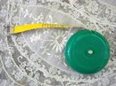 VINTAGE CELLULOID RETRACTABLE TAPE MEASURE