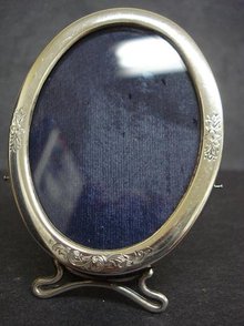 MINIATURE BIRKS STERLING OVAL PHOTO FRAME