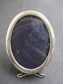 MINIATURE BIRKS STERLING OVAL PHOTO FRAME