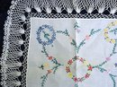 CENTERPIECE EMBROIDERY & WIDE LACE