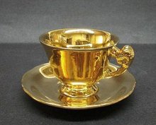 ROYAL WINTON TEACUP & SAUCER - GOLD