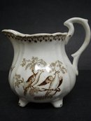 OLD BROWN TRANSFERWARE JUG