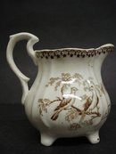 OLD BROWN TRANSFERWARE JUG