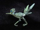 PRETTY SILVER TONE BROOCH - PIN - ROAD RUNNER