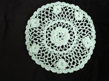 Unusual oval lace doily 3 D roses