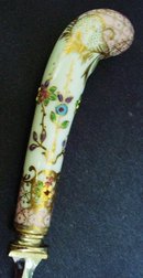 PRETTY PORCELAIN HANDLE BACON SERVING FORK