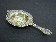 ORNATE TEA STRAINER FLORAL EMBOSSING