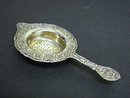 ORNATE TEA STRAINER FLORAL EMBOSSING